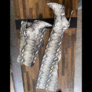 Thigh high snake print heel boots